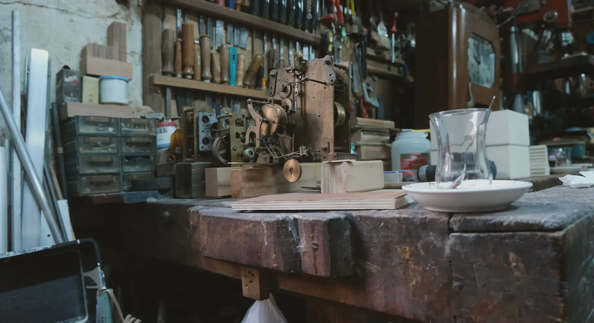 Traditional horology workshop with benches and tools